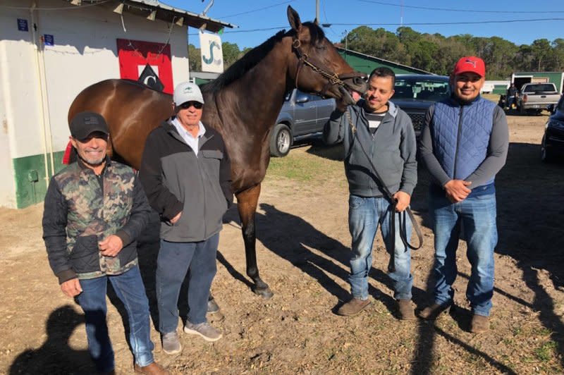 Patriot Spirit, with trainer Mike Campbell (white hat) and stable crew, is a contender in Saturday's Grade III Sam F. Davis at Tampa Bay Downs, a Kentucky Derby prep race. Photo courtesy of Tampa Bay Downs