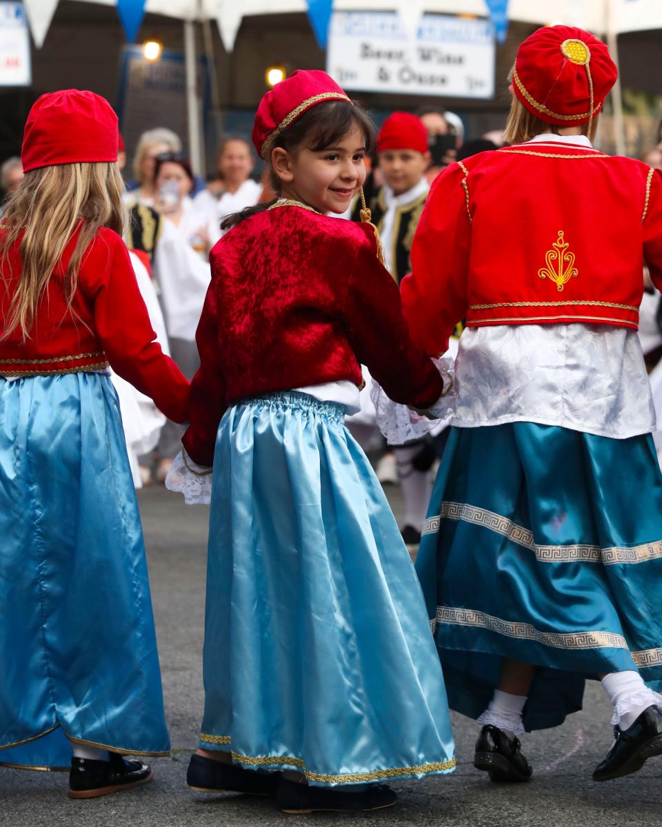 Emmanouela Tawfik, 6, performs traditional dances with other group members during the Greek Festival at the Holy Trinity Greek Orthodox Church in Wilmington, Tuesday, June 6, 2023.