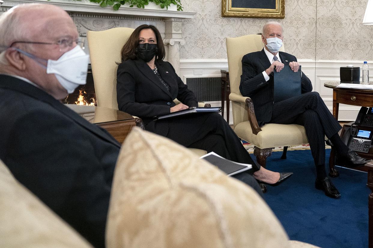 U.S. President Joe Biden (R) and Vice President Kamala Harris meet with Sen. Patrick Leahy (D-VT) and other Democratic senators to discuss his $1.9 trillion American Rescue Plan in the Oval Office at the White House in Washington, D.C.