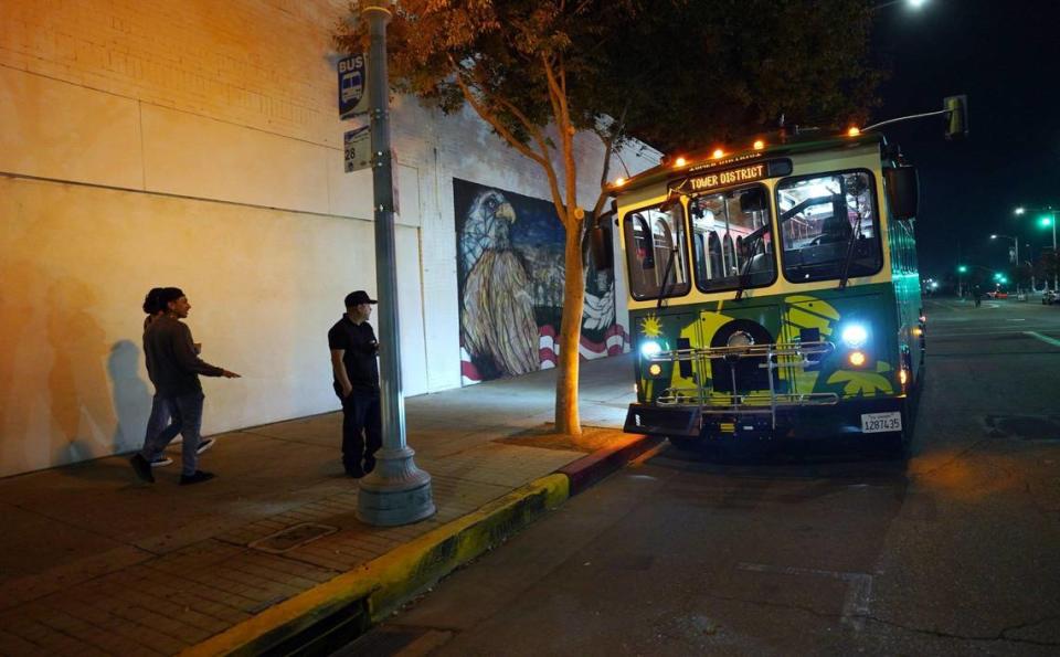 FresnoHOP is parked on Inyo Street near Broadway Street one block from Tioga-Sequoia Beer Garden Friday, Nov. 10, 2023 in downtown Fresno. The free trolley service links Fresno City College, Fresno State’s Campus Pointe, the Cultural Arts District, the Tower District and the Brewery District.