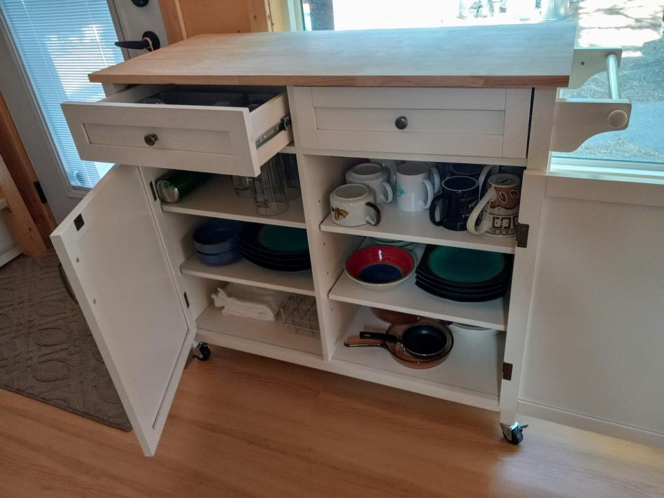 kitchen storage wit hshelves and drawers