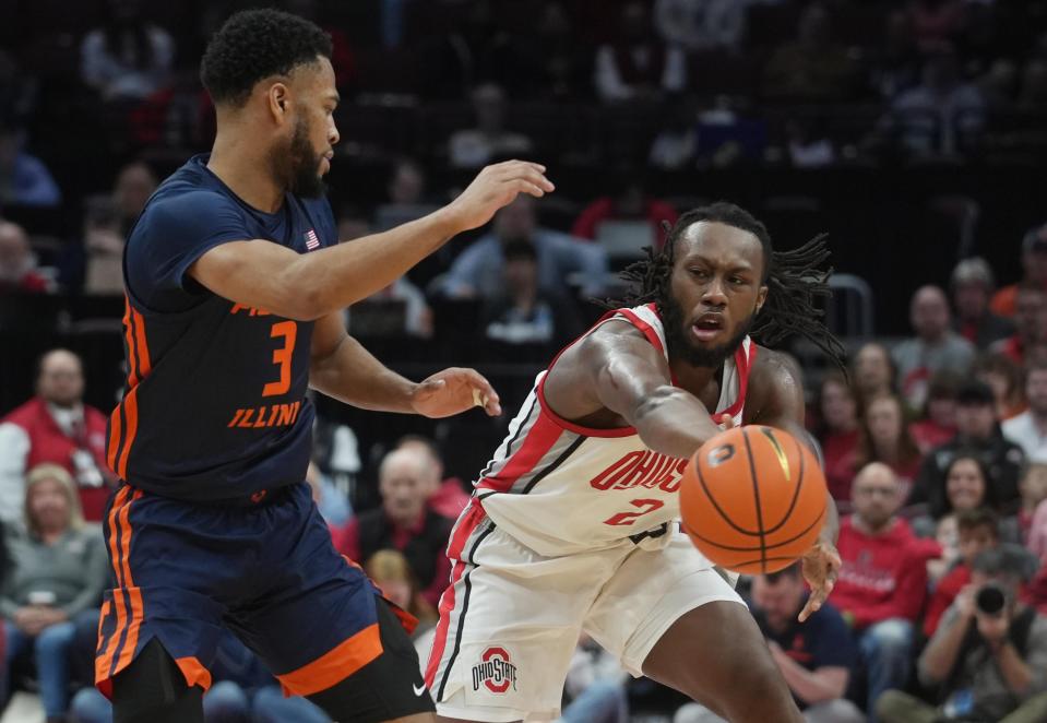 Feb 26, 2023; Columbus, OH, USA; Ohio State Buckeyes guard Bruce Thornton (2) passes around Illinois Fighting Illini guard Jayden Epps (3) during the first half of the NCAA basketball Feb. 26, 2023 at Value City Arena. Mandatory Credit: Doral Chenoweth-The Columbus Dispatch