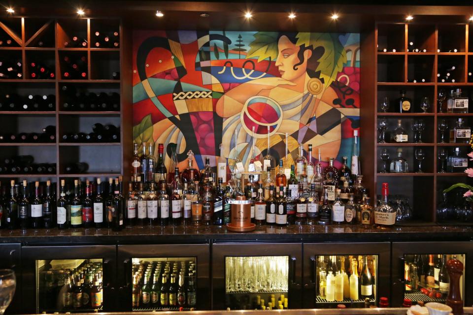 A mural resembling one above the dining room is seen at the bar of Bacco Ristorante in Southfield in February 2013.