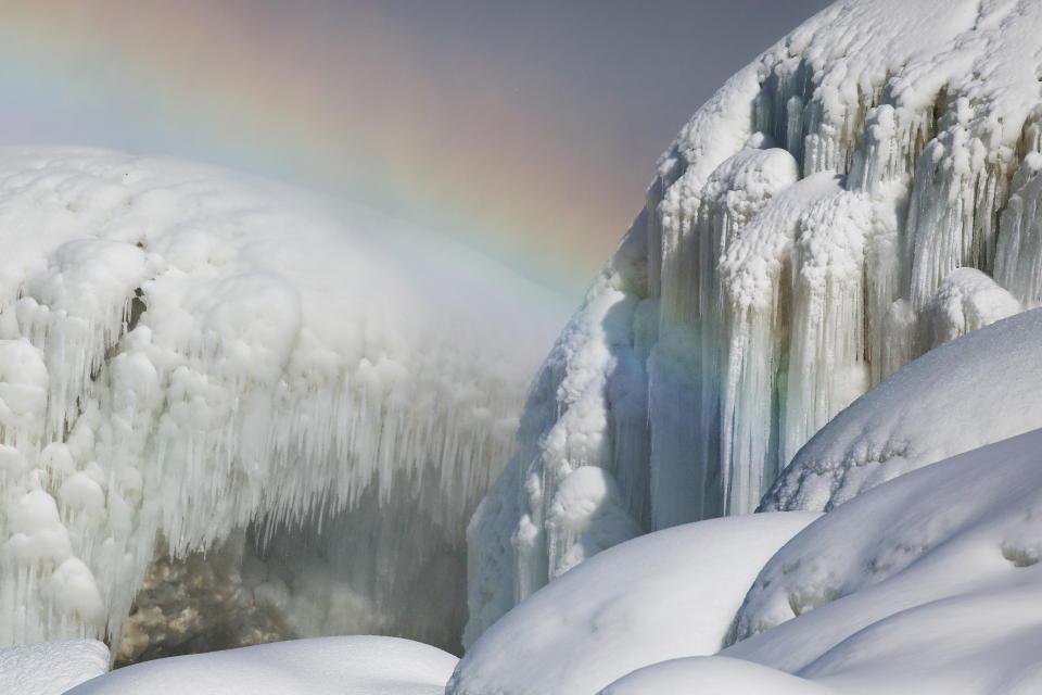 Ice sits at the base of the American Falls due to cold temperatures in Niagara Falls, New York, U.S., February 21, 2021.  REUTERS/Lindsay DeDario     TPX IMAGES OF THE DAY