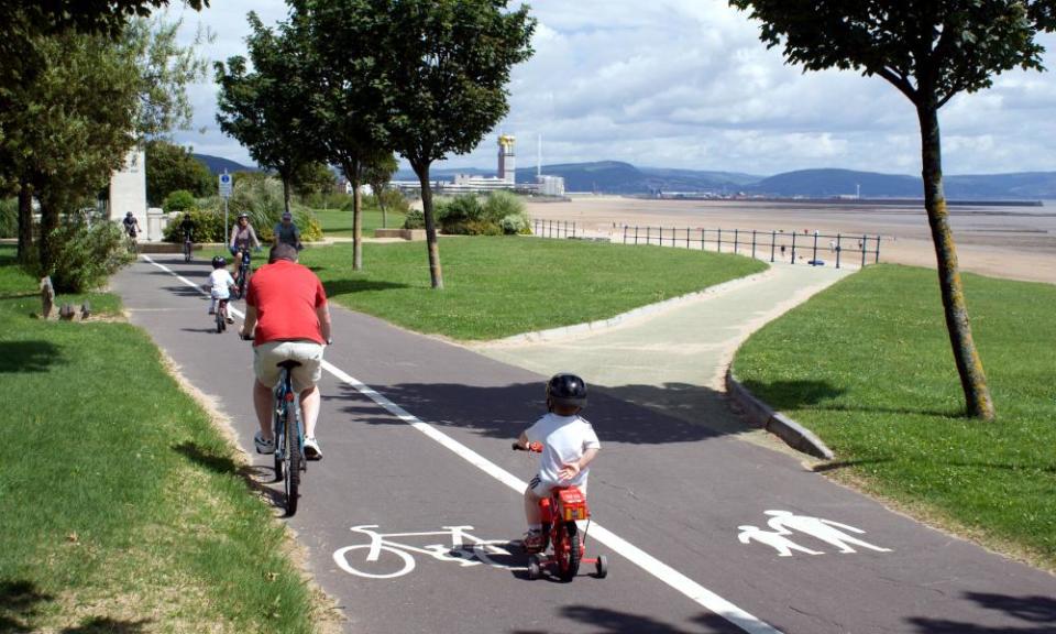 cyclists on swansea bay cycle path