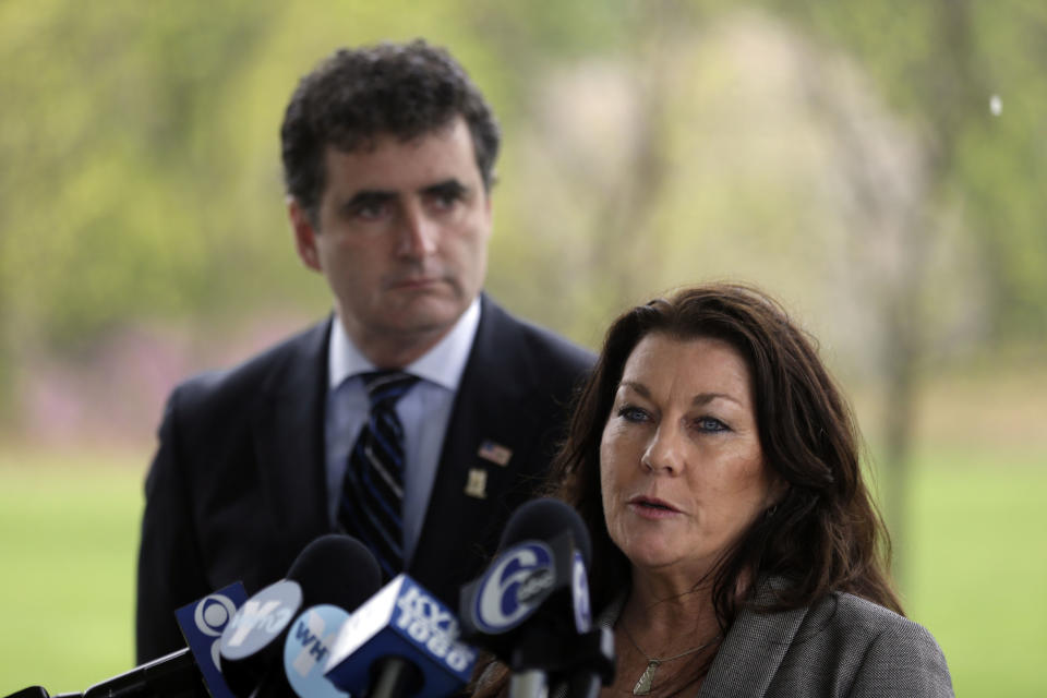 Rep. Mike Fitzpatrick, R-Pa., looks on as Ellen Saracini, whose husband Victor was the captain of United Airlines Flight 175 that crashed into the World Trade Center on Sept. 11, 2001, speaks during a news conference at the at the Garden of Reflection memorial to local victims of the 9/11 terrorist attacks, Monday, April 29, 2013, in Yardley, Pa. Fitzpatrick proposed new legislation aimed at protecting airline passengers and pilots from the kind of terrorist attack upon the nation a dozen years ago. (AP Photo/Matt Rourke)