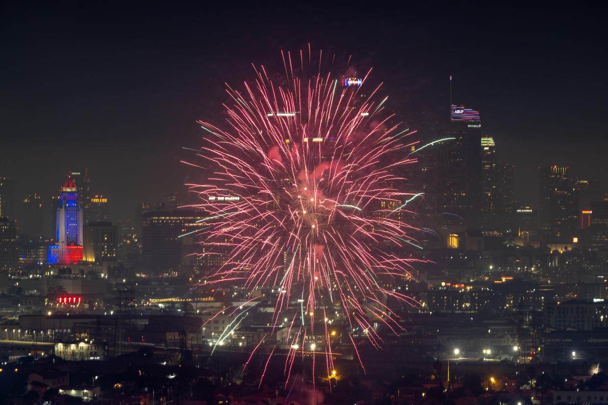 A fireworks display against the skyline of Los Angeles.