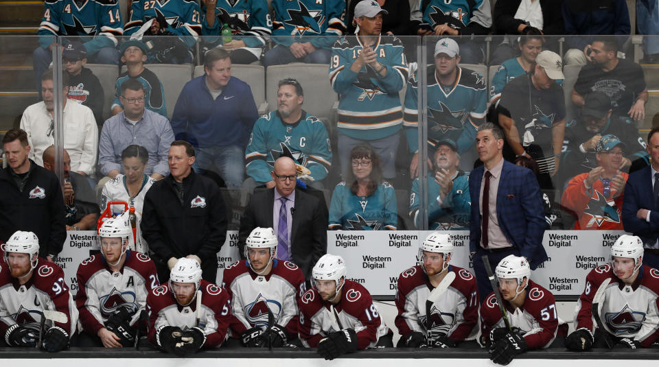 Colorado Avalanche head coach Jared Bednar, right, stands in the bench area in the third period against the San Jose Sharks in Game 1 of an NHL hockey second-round playoff series at the SAP Center in San Jose, Calif., on Friday, April 26, 2019. (AP Photo/Josie Lepe)
