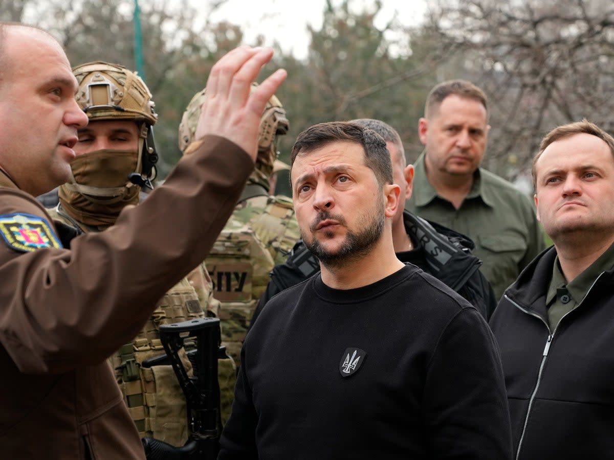 Volodymyr Zelensky, centre, in Zaporizhzhia (Efrem Lukatsky/AP)