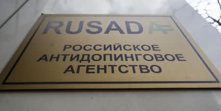 FILE PHOTO: A sign is on display outside the office of Russian Anti-Doping Agency (RUSADA) in Moscow, Russia March 28, 2018. REUTERS/Maxim Shemetov/File Photo