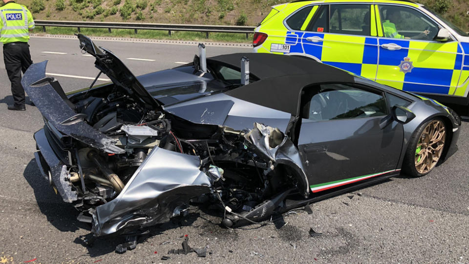 A 20 minute old brand new Lamborghini that stopped due to mechanical failure was hit from behind.