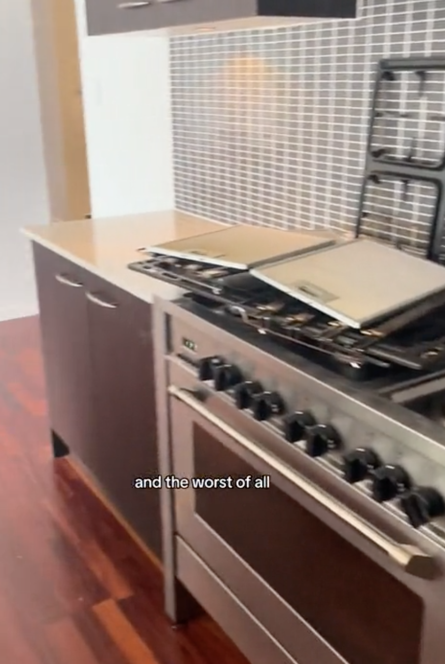 very large oven with the metal grates on top