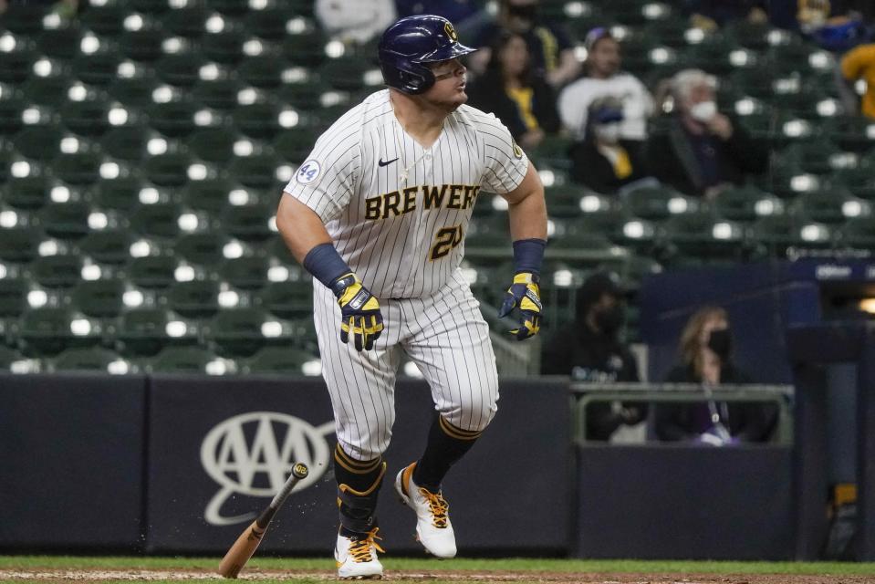 Milwaukee Brewers' Daniel Vogelbach hits a two-run home run during the seventh inning of a baseball game against the Pittsburgh Pirates Sunday, April 18, 2021, in Milwaukee. (AP Photo/Morry Gash)