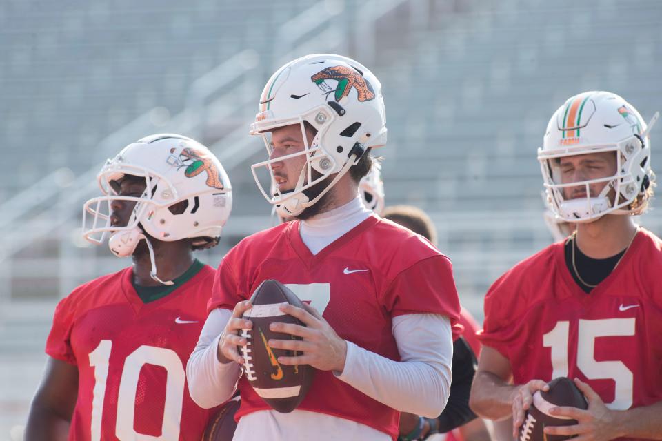 Quarterback Junior Muratovic with quarterbacks Daniel Richardson (10) and Bryson Martin (15) during FAMU team practice on Friday, August 9 2024.