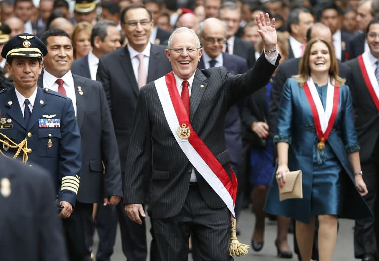 Peru's new president Pedro Pablo Kuczynski walks to the Government Palace in Lima on July 28, 2016