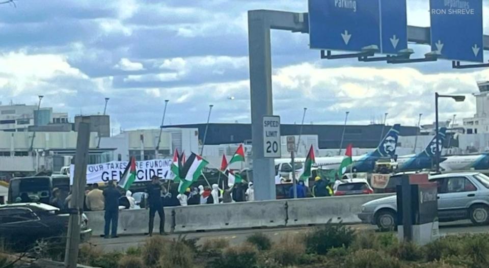 The protest blocked arrivals and departures at Sea-Tac Airport. Ron Shreve