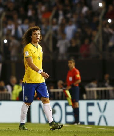 David Luiz of Brazil leaves the field after receiving a red card during their 2018 World Cup qualifying soccer match against Argentina in Buenos Aires, Argentina, November 13, 2015. REUTERS/Martin Acosta