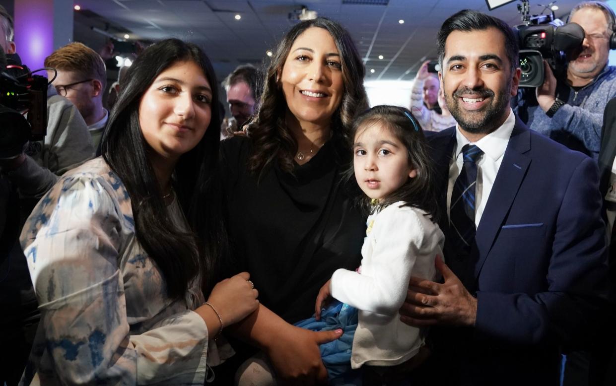 Humza Yousaf with his wife Nadia El-Nakla, daughter Amal and step-daughter after his victory was announced - Andrew Milligan/PA