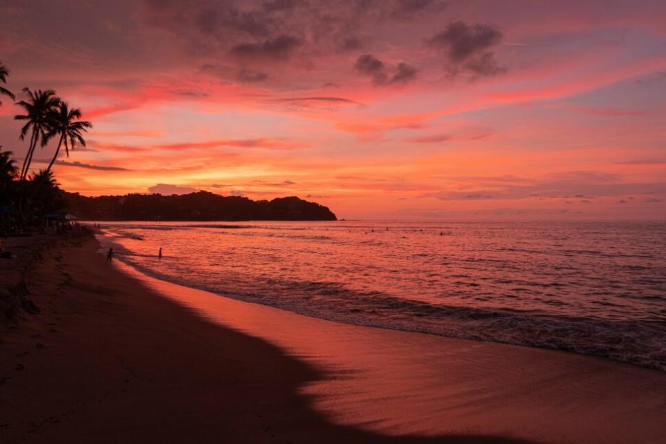 Warm orange sunset on a beautiful beach in Mexico