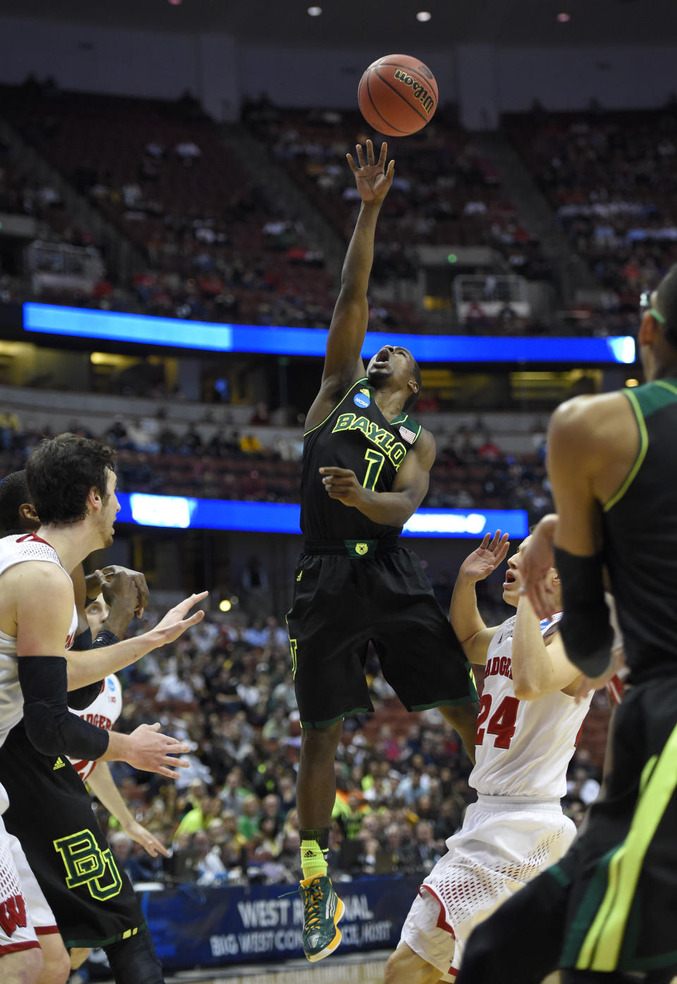 Baylor guard Kenny Chery (1) shoots against Wisconsin during the first half of a regional semifinal NCAA college basketball tournament game, Thursday, March 27, 2014, in Anaheim, Calif. (AP Photo/Mark J. Terrill)