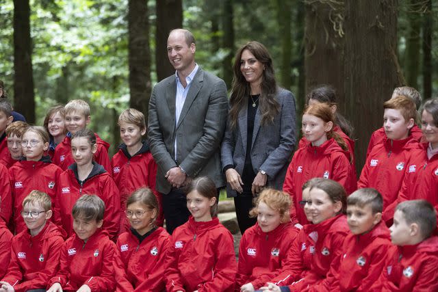 <p>David Rose - WPA Pool/Getty </p> Prince William and Kate Middleton visit Madley Primary School's Forest School in September.