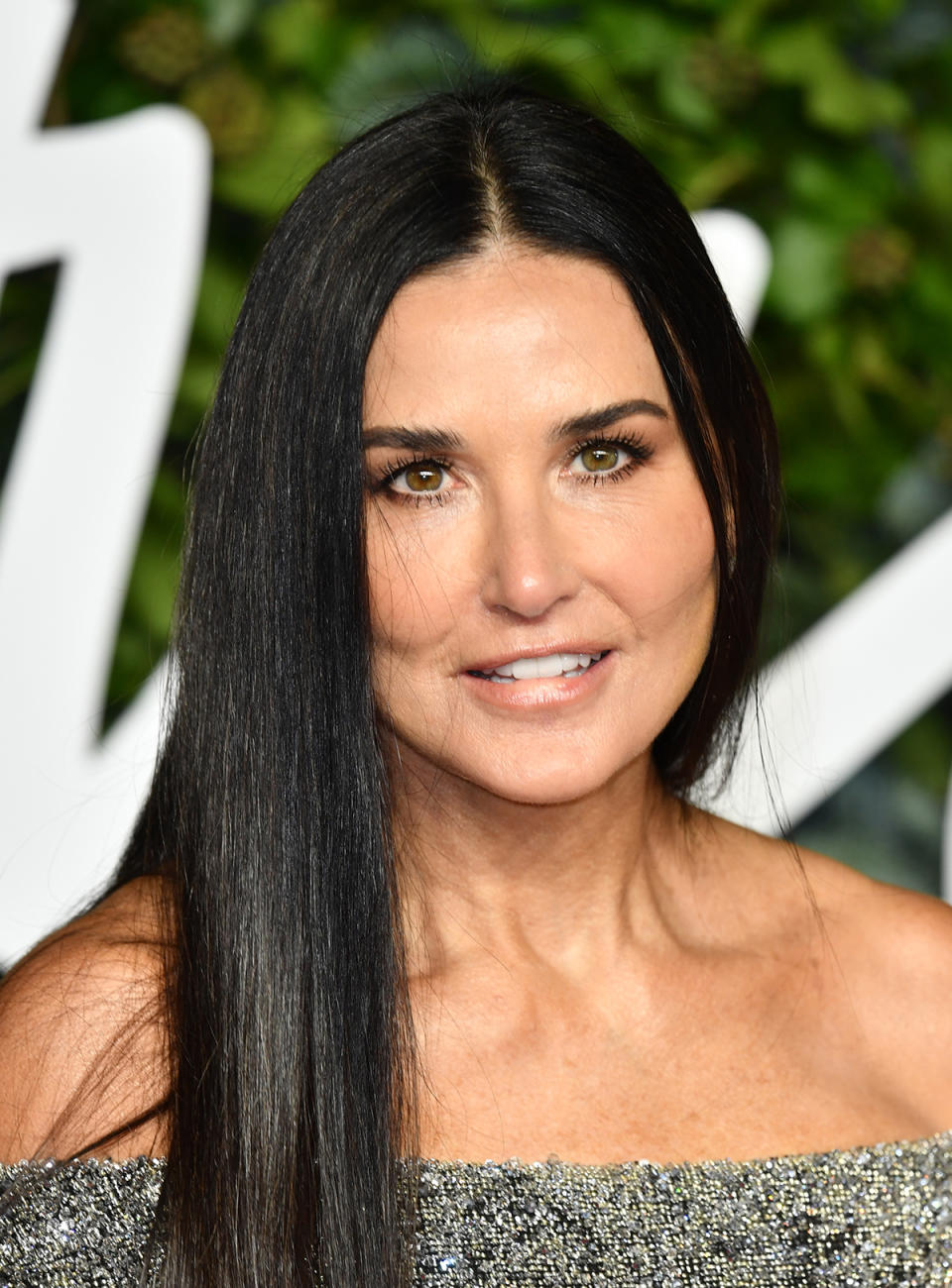 A headshot of Demi Moore on the red carpet at The Fashion Awards 2021 at the Royal Albert Hall on November 29, 2021 in London, England