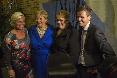 Norway's opposition leaders (L-R) Siv Jensen of the Fremskrittspartiet (Progress party), Erna Solberg of the Hoyre (Conservative party), Trine Skei Grande of the Venstre (Liberal party) and Knut Arild Hareide of the Kristelig Folkeparti (Christian Democratic party) gather inside the Parliament building in Oslo, after the general elections, September 9, 2013. REUTERS/Fredrik Varfjell/NTB Scanpix