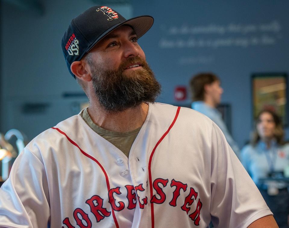 Red Sox star Jonny Gomes talks to fans inside the DCU Club at Polar Park Thursday.