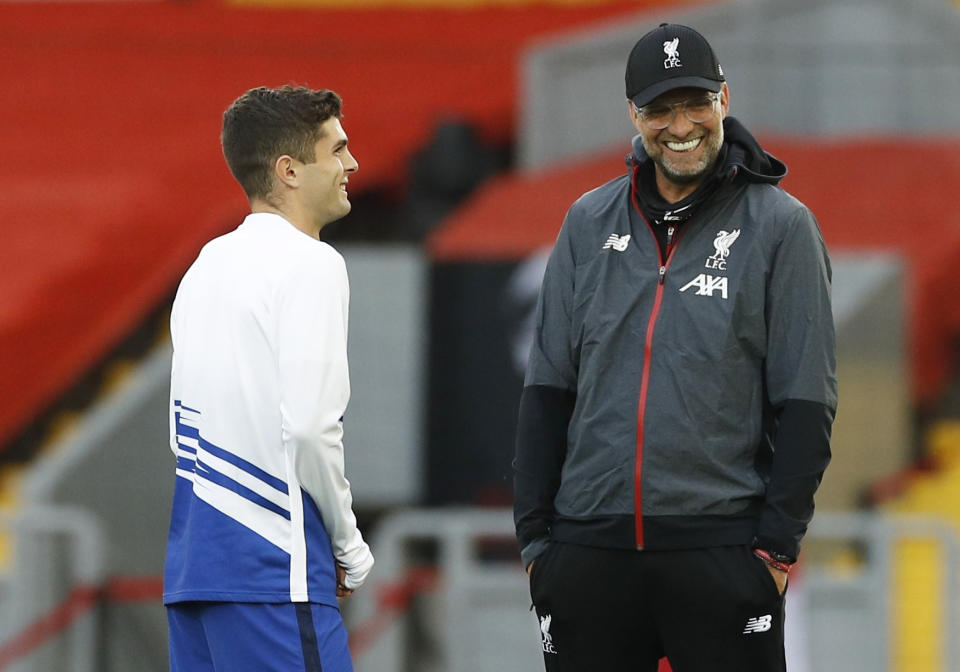 Liverpool manager Jurgen Klopp (right) gave Christian Pulisic his first major opportunities at Borussia Dortmund. (Pool via REUTERS/Phil Noble)