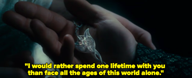 A man holds a jewel necklace as a woman says "I would rather spend one lifetime with you than face all the ages of this world alone"