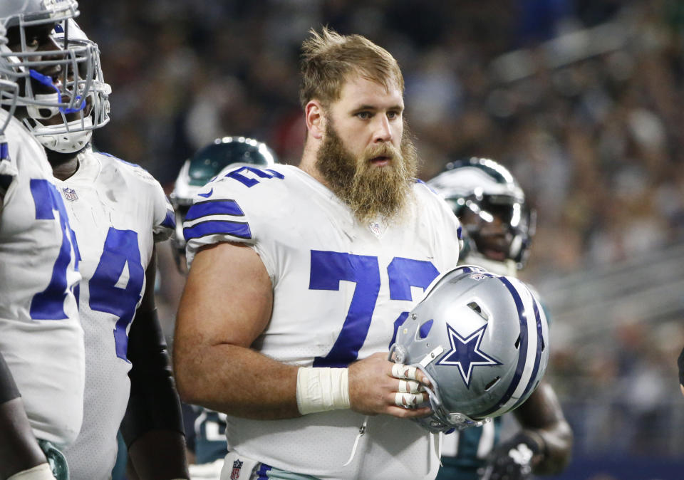 FILE - In this Nov. 19, 2017, file photo, Dallas Cowboys center Travis Frederick (72) rests during a timeout in the team's NFL football game against the Philadelphia Eagles in Arlington, Texas. Frederick said Wednesday, Aug. 22, 2018, that he has been diagnosed with a rare neurological disorder that causes weakness in various parts of the body, and the four-time Pro Bowl player isn’t sure on a timetable for a return. Frederick says he has received two treatments for Guillain-Barre Syndrome over the past 48 hours and that the treatments will continue for several days. (AP Photo/Michael Ainsworth, File)