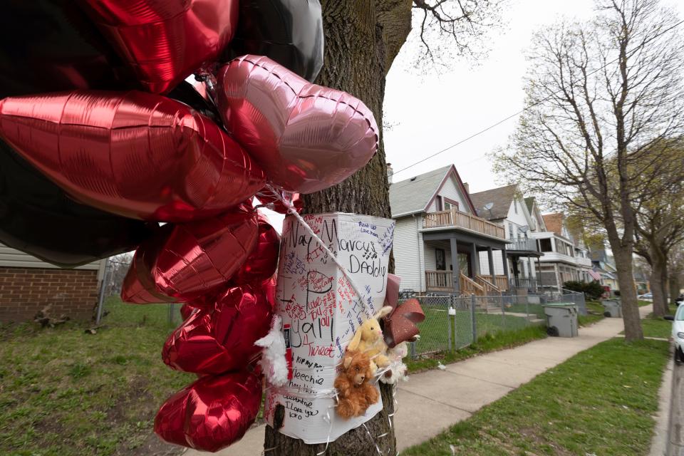 A memorial to five people who were shot to death is tied to a tree in the 2800 block of North 12th Street in April 2020. Christopher P. Stokes, the gunman, repeatedly came to the attention of authorities for allegations of violence, according to online court and state records.