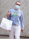 <p>Scarlett Johansson picks up breakfast in The Hamptons, New York, on Wednesday wearing striped pants and a hoodie.</p>