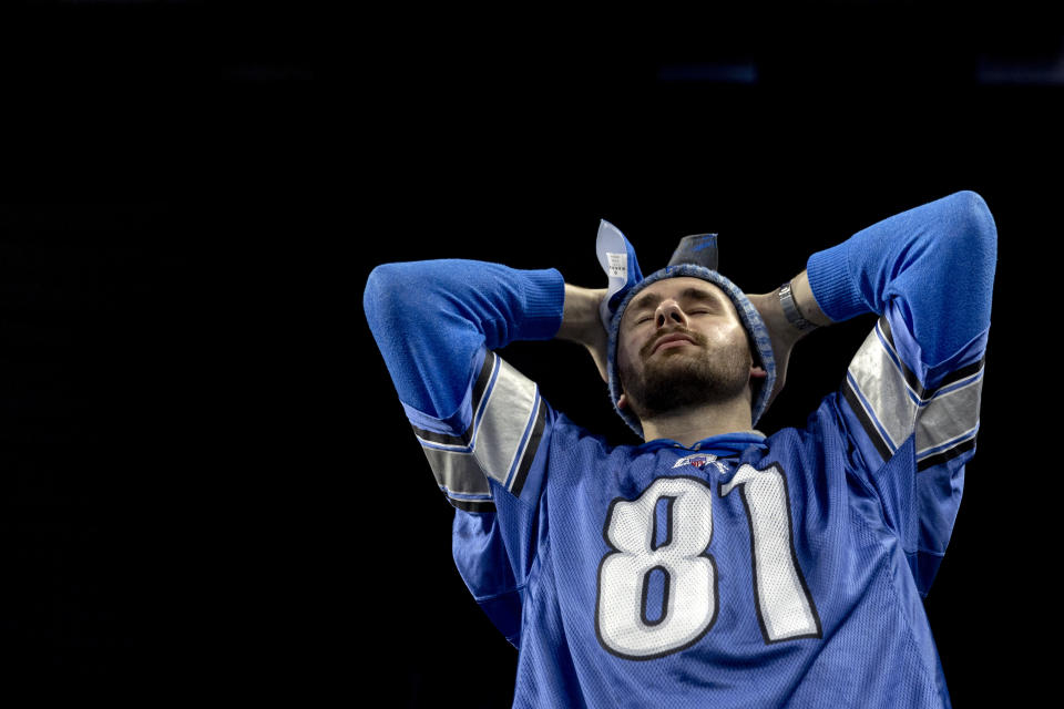 A Detroit Lions fan reacts in the second half at Detroit's Ford Field during a watch party for the NFC Championship NFL football game against the San Francisco 49ers in Santa Clara, Calif., Sunday, Jan. 28, 2024. (Jake May/The Flint Journal via AP)