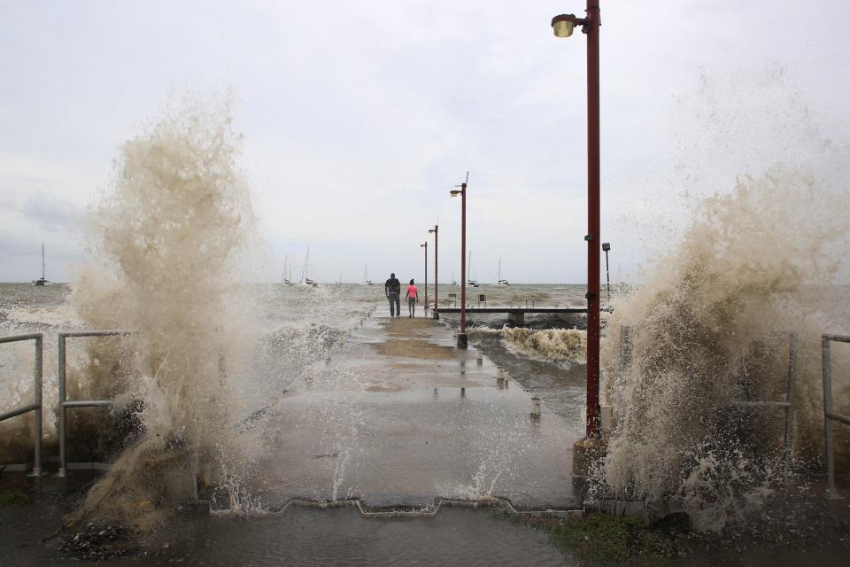 Waves crash into a pier after Hurricane Beryl passes by Port of Spain, Trinidad and Tobago, on July 1, 2024.