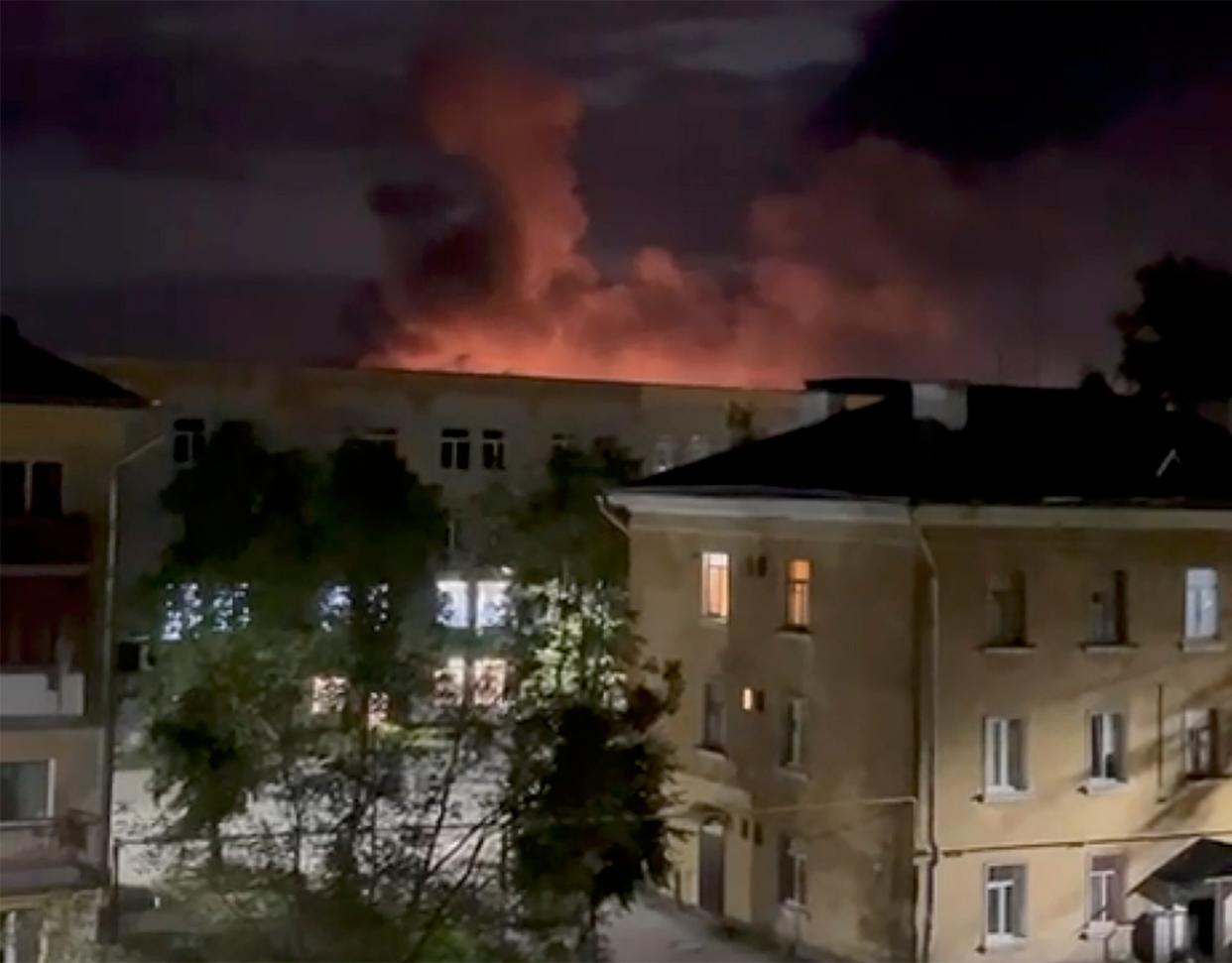 Smoke billows after Russian militaries destroyed drones in Pskov, Russia, 30 August 2023 (EPA)