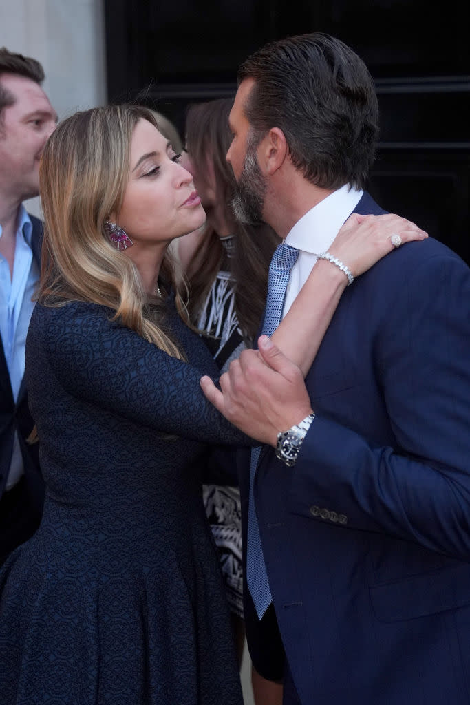 Holly Valance kisses Donald Trump Jr. farewell as he leaves a fundraiser for Donald Trump hosted by the former <em>Neighbours</em> star in London on June 12, 2024. <span class="copyright">James Manning—Getty Images</span>