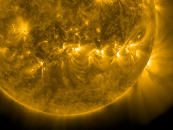 A view from NASA's SDO shows the sun on April 21, 2023. A CME is seen at the surface of the sun.