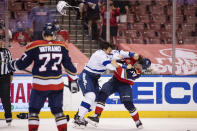 Tampa Bay Lightning defenseman Luke Schenn (2) loses his helmet during a brawl with Florida Panthers left wing Ryan Lomberg (94) during the second period of an NHL hockey game on Saturday, May 8, 2021, in Sunrise, Fla. (AP Photo/Mary Holt)