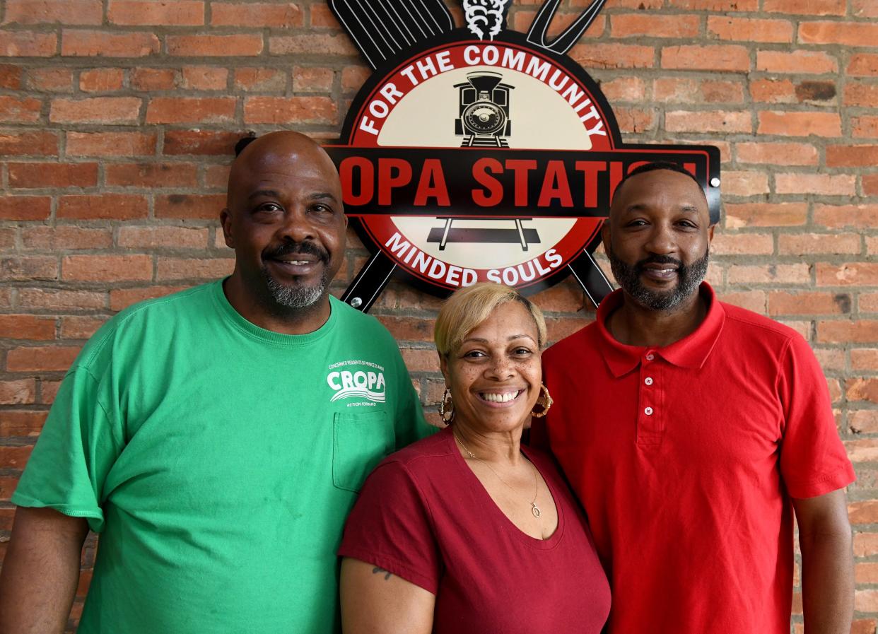 Dale Parker, left, Lynnell Fletcher-Pugh and Troy Selby, co-owners of Cropa Station, Wednesday, May 3, 2023, in Princess Anne, Maryland.