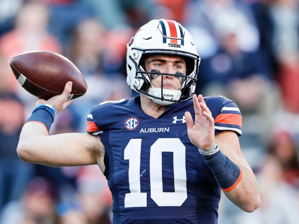 Bo Nix throws a pass during a game in 2021.