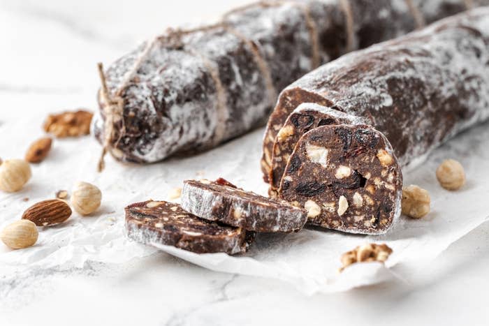 A sliced chocolate salami