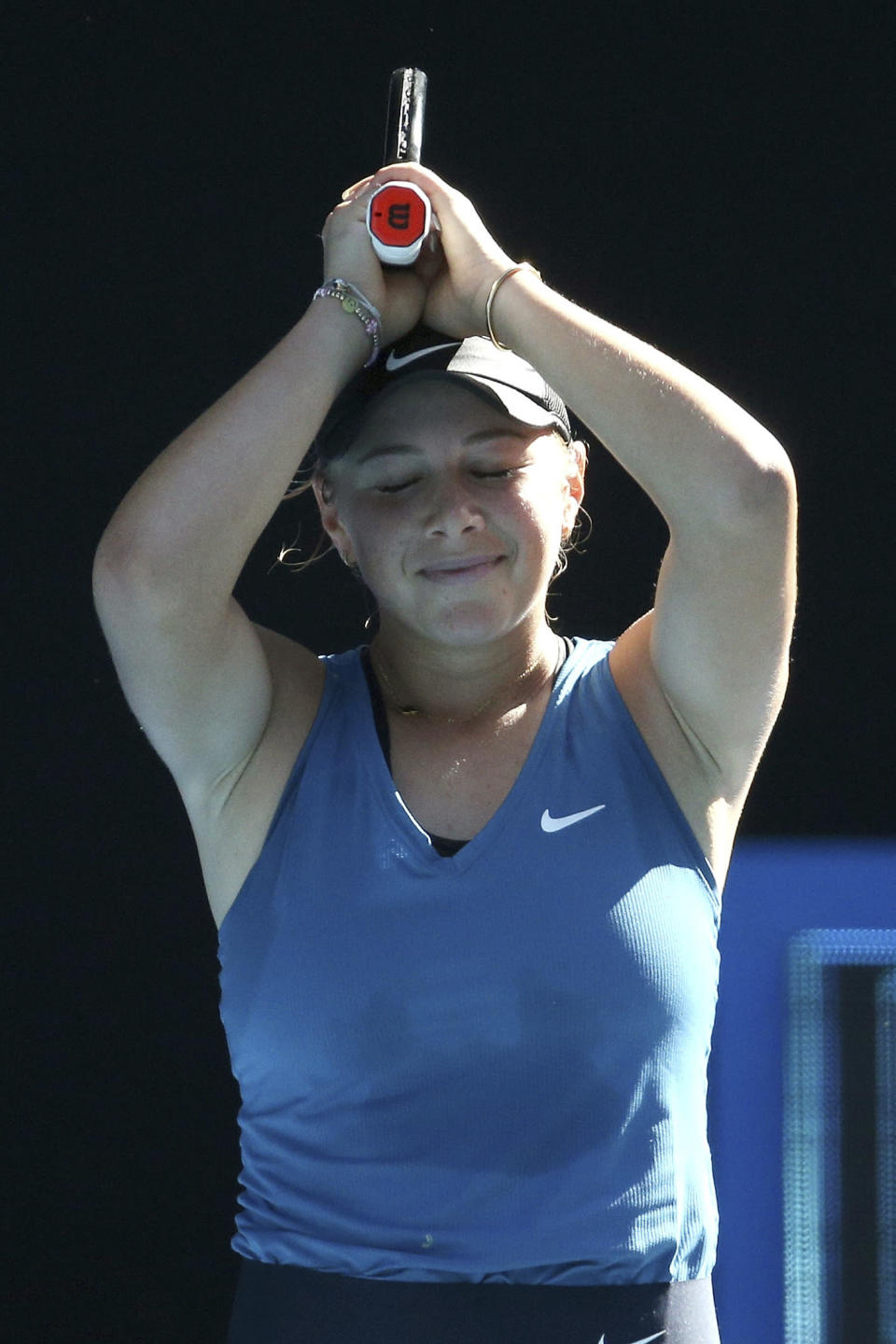 Amanda Anisimova of the United States reacts to winning the match during her singles match against Aliaksandra Sasnovich of Belarus during the women's final of the Summer Set 2 tournament ahead of the Australian Open in Melbourne, Australia, Sunday, Jan. 9, 2022. (AP Photo/Hamish Blair)