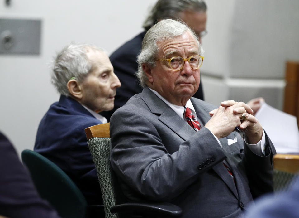 Defense attorney Dick DeGuerin, right, sits with his client real estate heir Robert Durst during Durst's murder trial at the Airport Branch Courthouse in Los Angeles on Wednesday, March 4, 2020. After a Hollywood film about him, an HBO documentary full of seemingly damning statements, and decades of suspicion, Durst is now on trial for murder. In opening statements Wednesday, prosecutors will argue Durst killed his close friend Susan Berman before New York police could interview her about the 1982 disappearance of Durst's wife. (Etienne Laurent/EPA via AP, Pool)