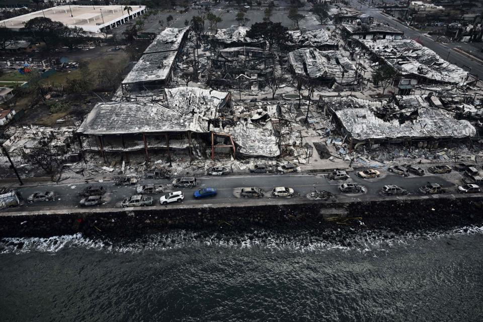 An aerial image taken on August 10, 2023 shows destroyed buildings on the waterfront burned to the ground in Lahaina in the aftermath of wildfires in western Maui.