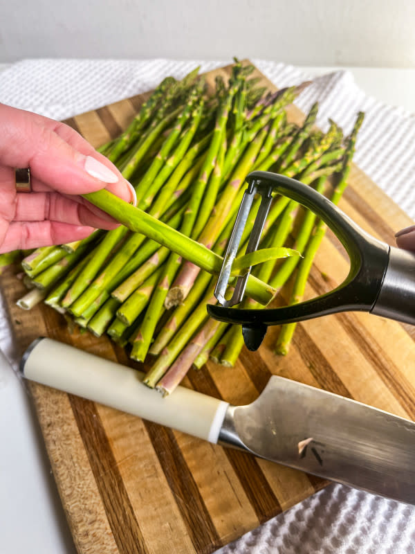 Peeling the lower third of an asparagus spear<p>Courtesy of Jessica Wrubel</p>