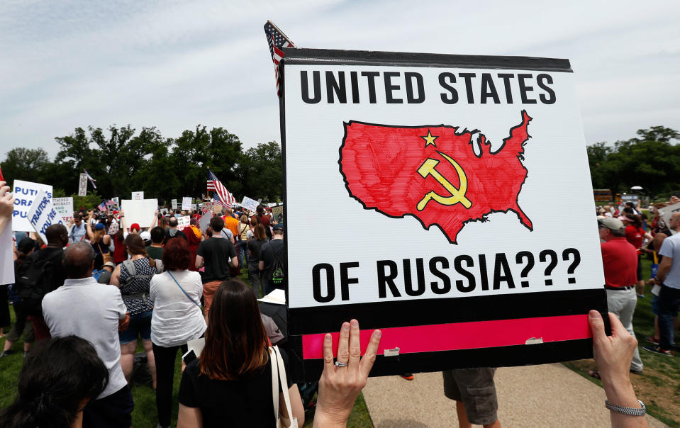 A protester holds a sign on the National Mall