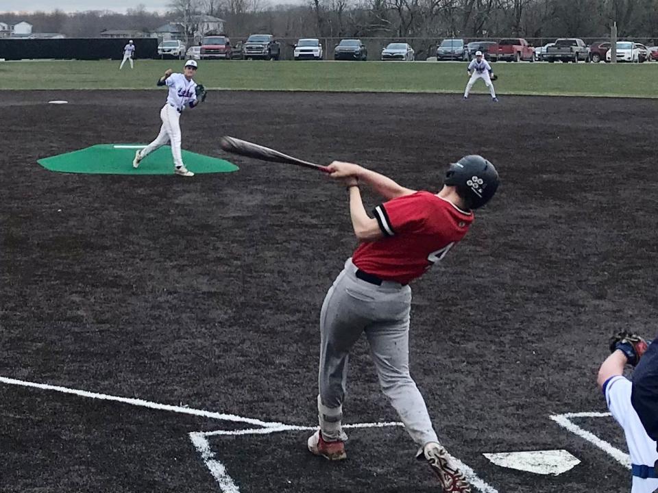 Marion Harding's Maddox McGuire takes a cut during a road baseball game at Highland last season.