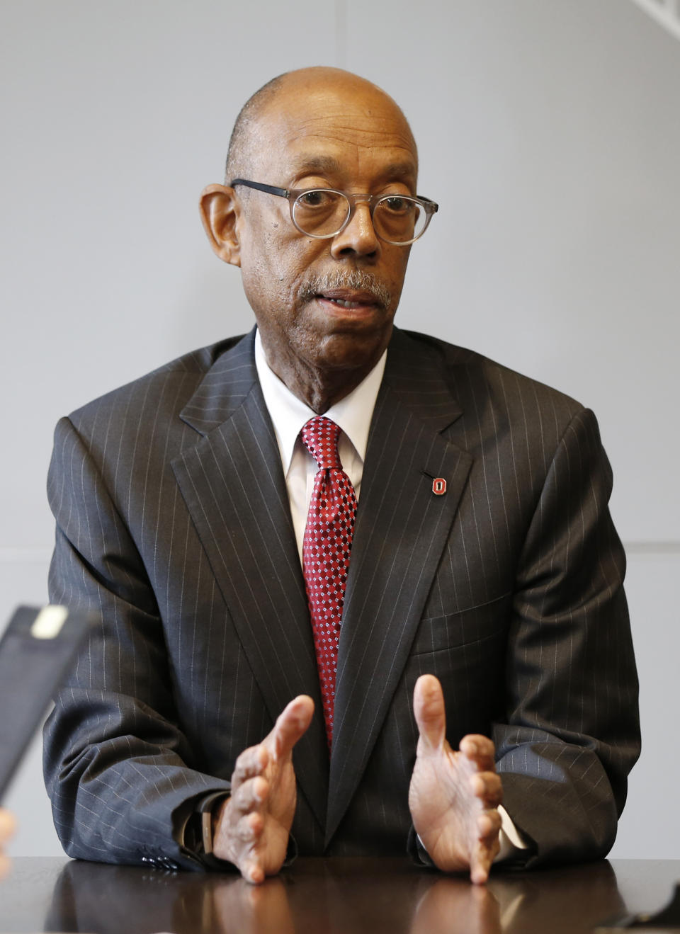 Ohio State University president Michael Drake answers questions during an interview about the accusations against former Ohio State team doctor Richard Strauss Friday, May 17, 2019, in Columbus, Ohio. An investigation found that Strauss sexually abused at least 177 athletes from at least 16 sports as well as others from his work at the student health center and his off-campus clinic. (AP Photo/Jay LaPrete)