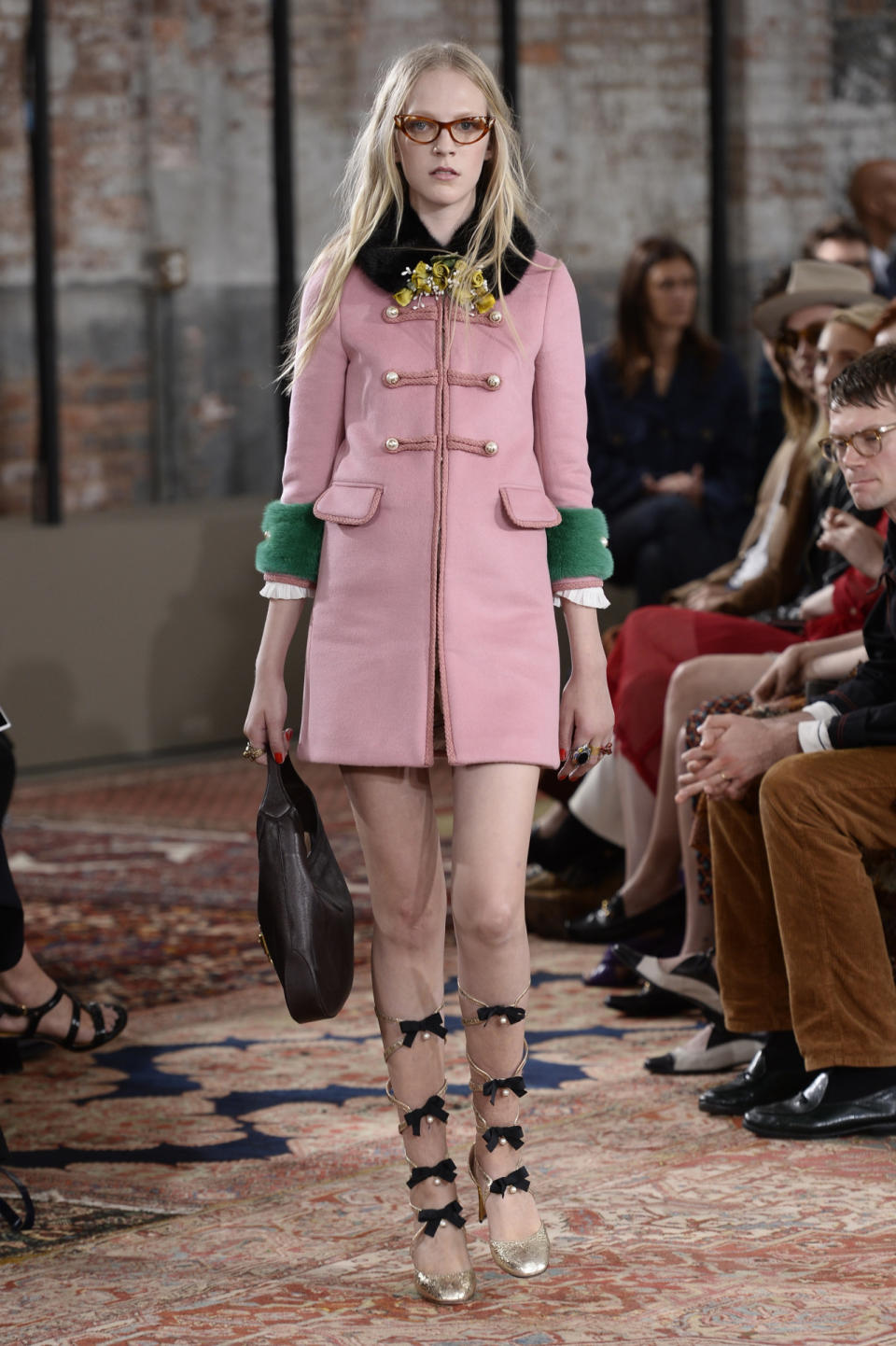 A pink coat with fur trim from the Gucci Resort collection.